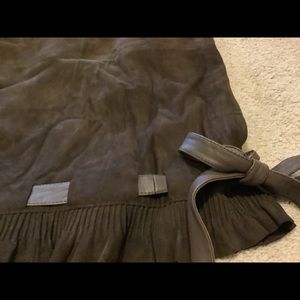 Lamb suede skirt with leather bow at hem